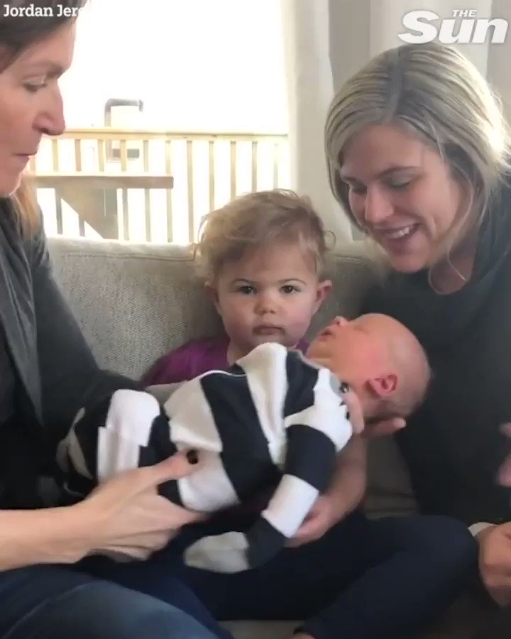 This toddler is not too thrilled to meet her baby brother...