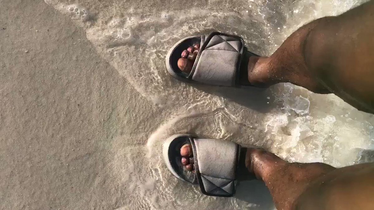 Yeezy slides on vacay https://t.co/R819Sn9r3Z