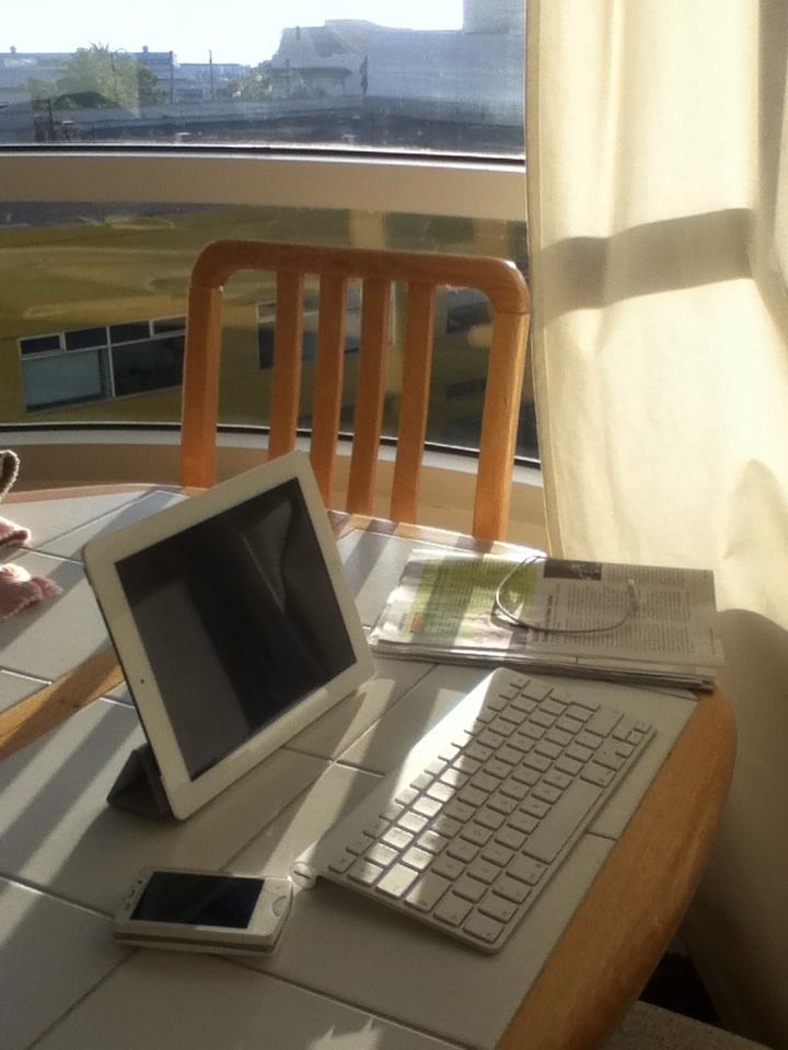 iPad standing up with a bluetooth keyboard