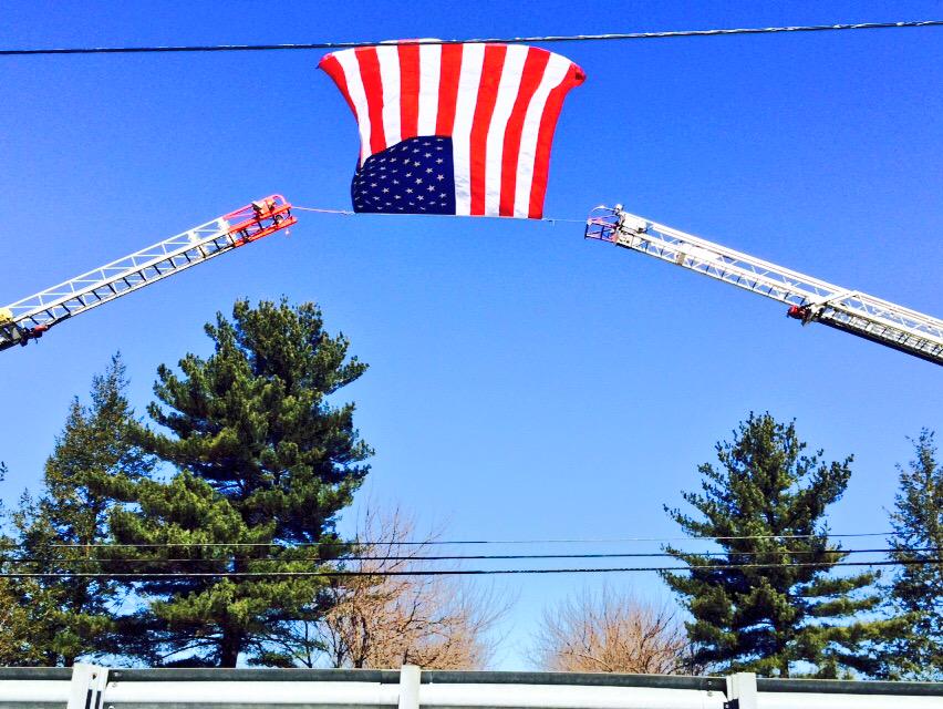 Ladder Trucks Pgfd Ladder Trucks Form Crossed Arches With Us Flag