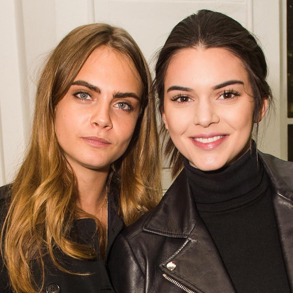 Kendall jenner and cara delevingne look so alike in this photo, it's