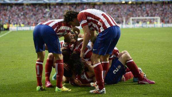 Atletico players celebrate opening goal [via @ChampionsLeague]