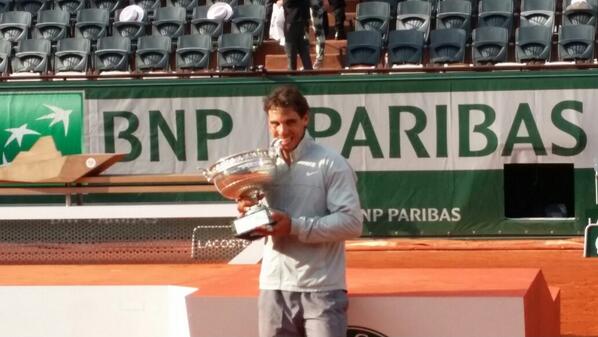 Nadal bites the French Open title [via @RolandGarros]