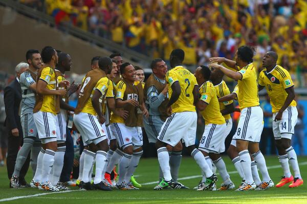 Colombia players celebrate first goal [via @FIFAWorldCup]