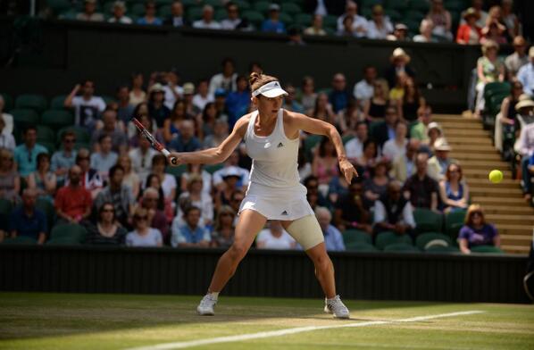 Halep returns a shot against Lisicki [via @wimbledon]