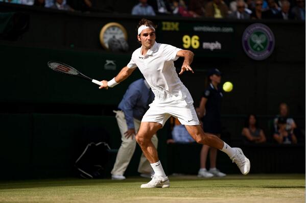 Federer returns a shot against Raonic [via @wimbledon]