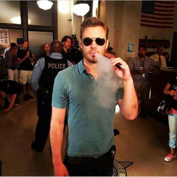 Jesse Lee Soffer smoking a cigarette (or weed)
