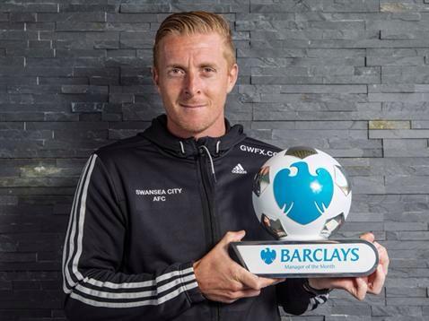 Monk with the Manager of the month award [via @SwansOfficial]