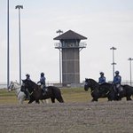 Guard is dead as prison standoff ends