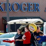 Police chase vehicle following robbery, shooting at Porter Kroger