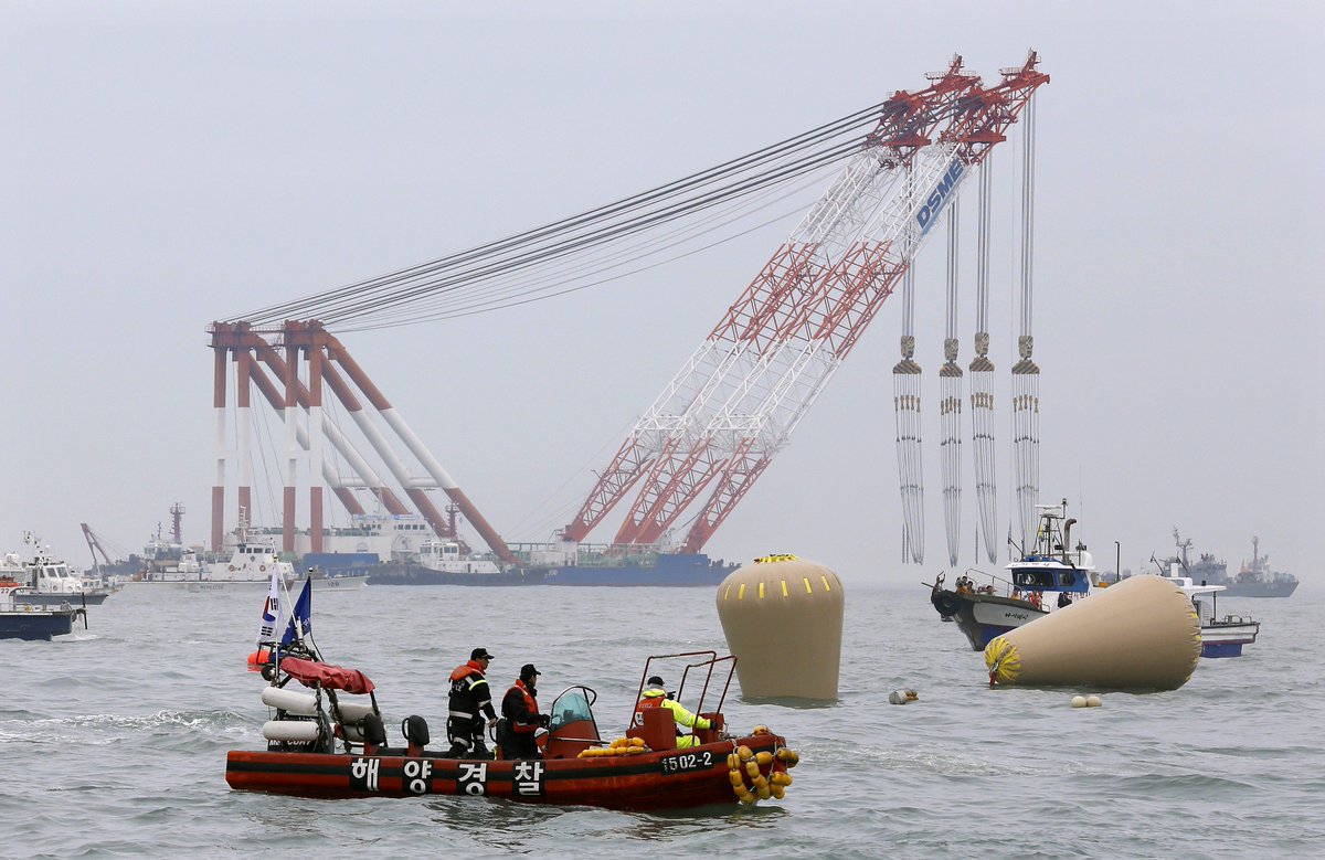 Southkorea announces plan raise sunken sewol ferry - scoopnest.com