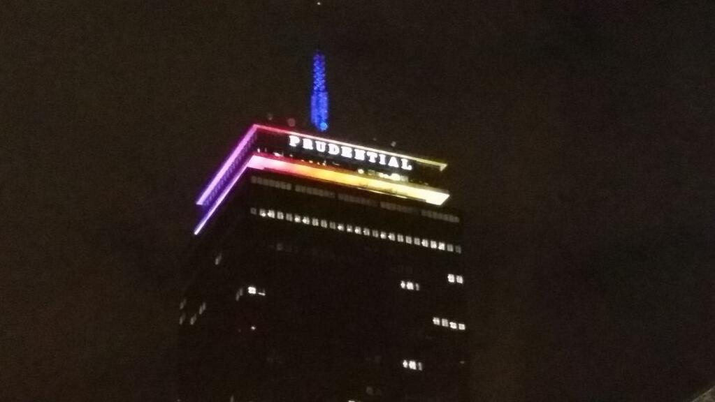 RT @OnlyInBOS: The Pru is lit in rainbow colors tonight in honor of @BostonPride. #WickedProud http://t.co/RJImrgvthz