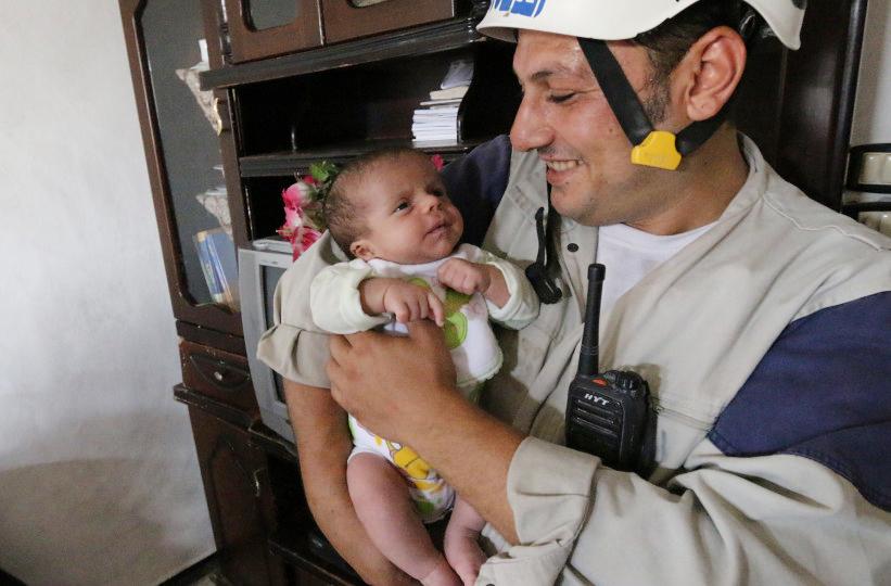 Visiting baby Muhammad for the first time after finding him in the rubble. #ShareHumanity http://t.co/lPvLdL0RRM