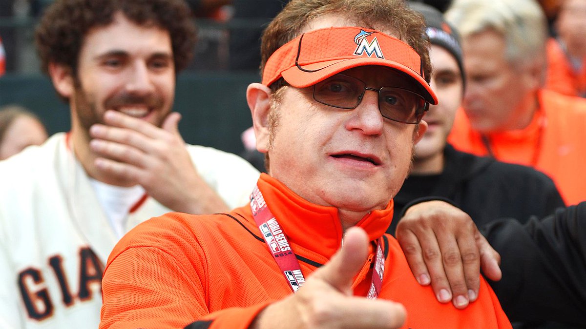 who is the guy in the orange marlins jersey