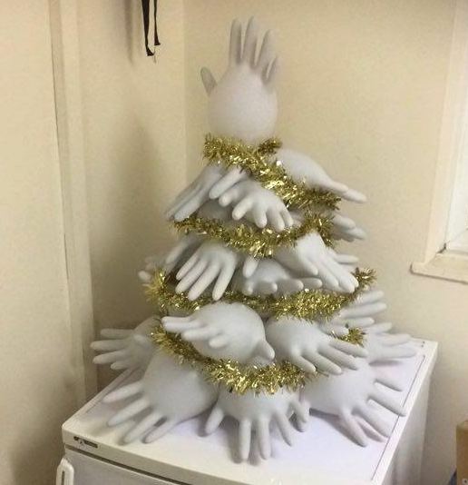 Cashstrapped paramedic students make their own rubber glove christmas