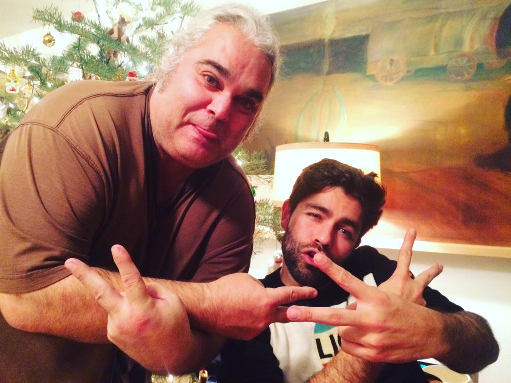 Uncle Dave and me throwing up out Christmas peace signs. https://t.co/LqPP3KDM13