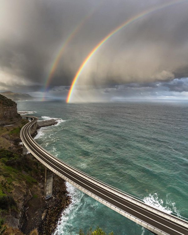 Sea Cliff Bridge, New South Wales, Australia | Photography by ©@david_wimble https://t.co/8onDZS0s8t