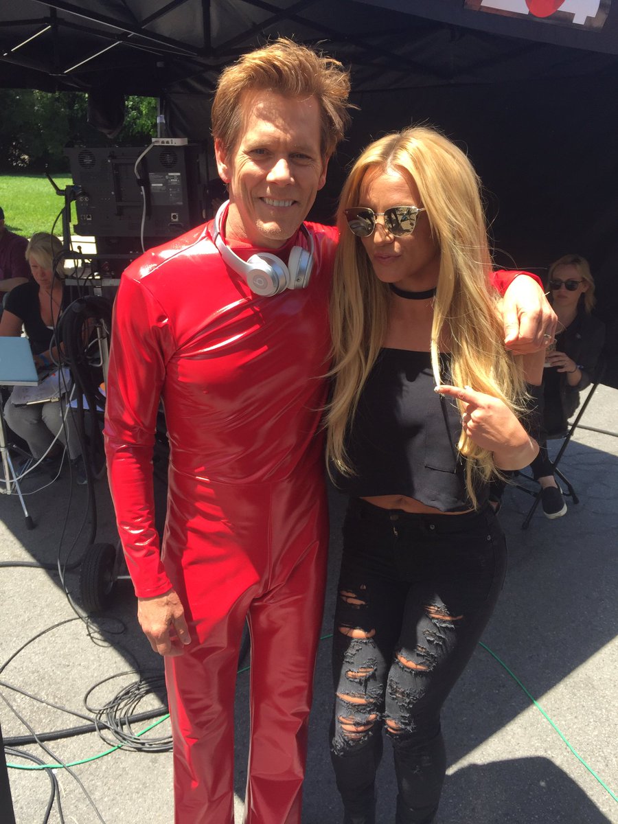 Make Me Oops in that red jumpsuit, @KevinBacon ???? #tbt to our @EE and @AppleMusic commercial! https://t.co/SVBI3SasST