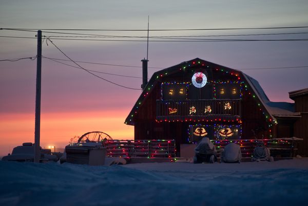 Photos: Holiday lights brighten winter darkness on Alaska's Arctic coast