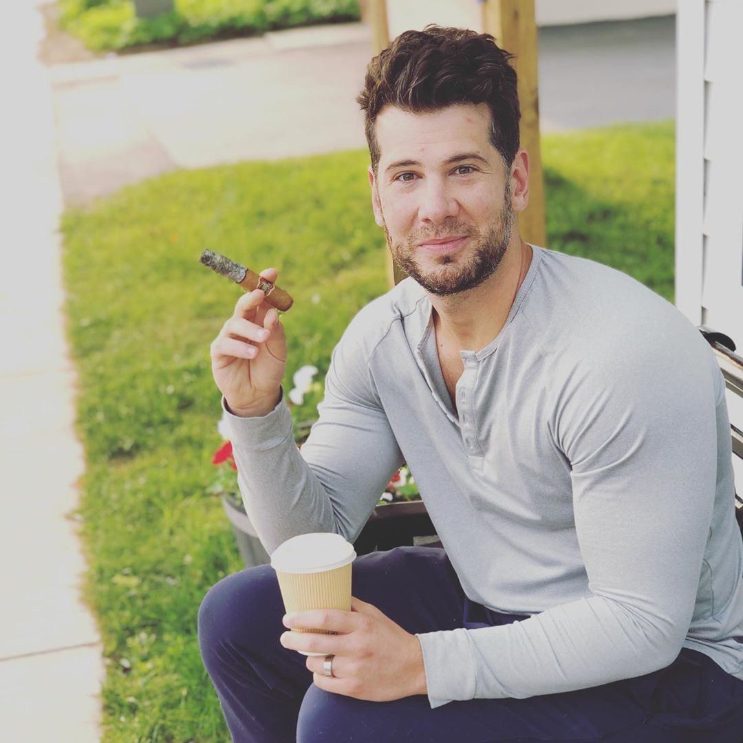 Steven Crowder smoking a cigarette (or weed)

