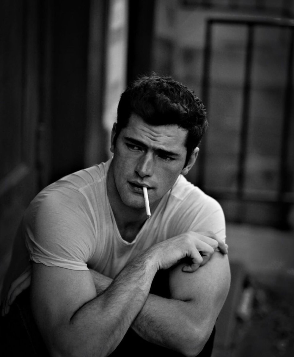 Sean O’Pry smoking a cigarette (or weed)
