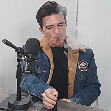 Drake Bell smoking a cigarette (or weed)
