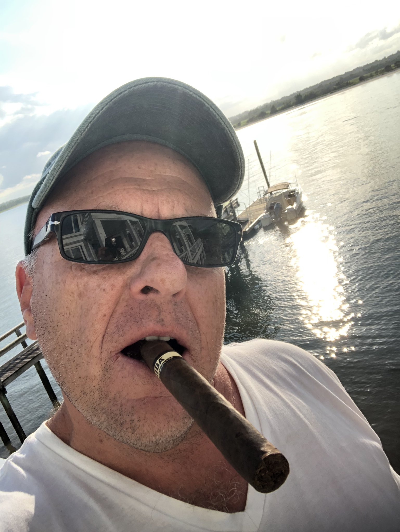 Dean Norris smoking a cigarette (or weed)

