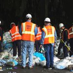 Workers help woman find necklace buried in hospital waste Workers help woman find necklace buried in hospital waste