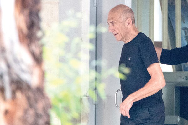 Israeli ex-premier freed from jail after parole in graft case