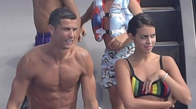 Cristiano Ronaldo's girlfriend Georgina Rodriguez shows off 'growing baby bump' on holiday in Ibiza as pregnancy rumours continue to gather pace