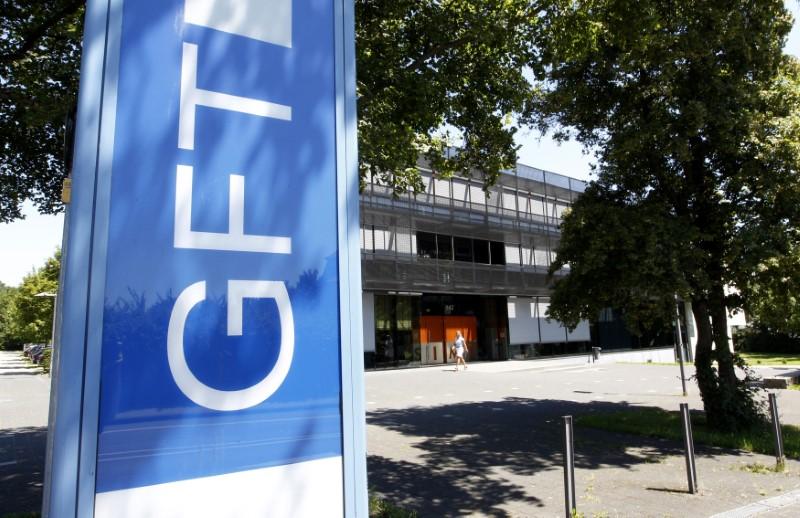 Germany's GFT warns on profit as Deutsche and Barclays cut spending