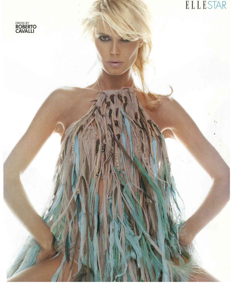 Photo Blast From the Past: fringe, feathers, Friday, on my! @Roberto_Cavalli https://t.co/r0zgxMAHvI