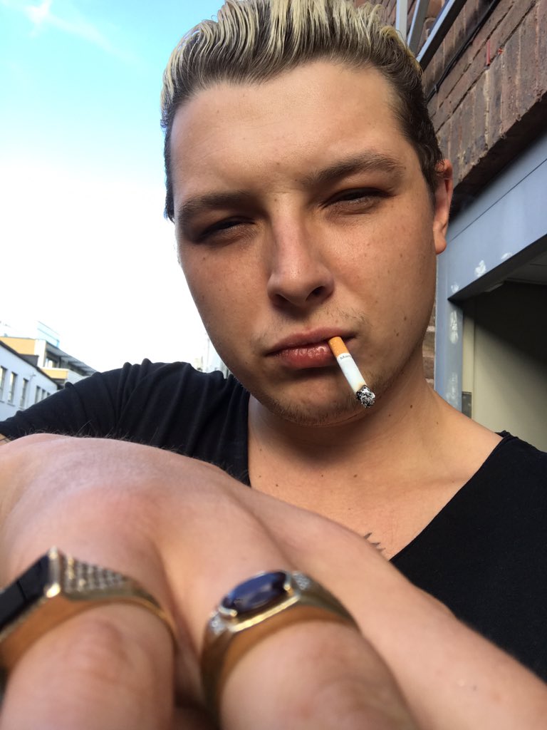 John Newman smoking a cigarette (or weed)
