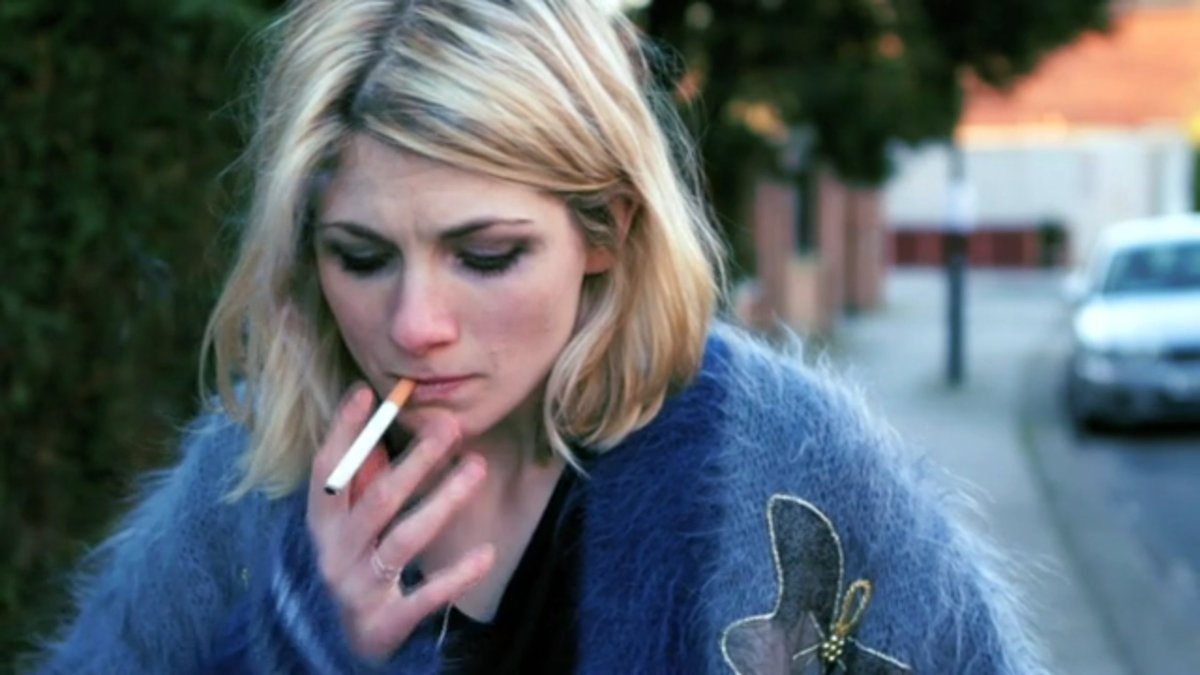 Jodie Whittaker smoking a cigarette (or weed)
