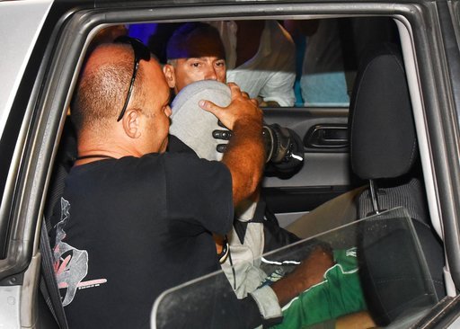 Italy police nab refugee as last suspect in beach gang rape
