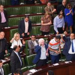 Tunisia pardons thousands with corrupt past, amid protest