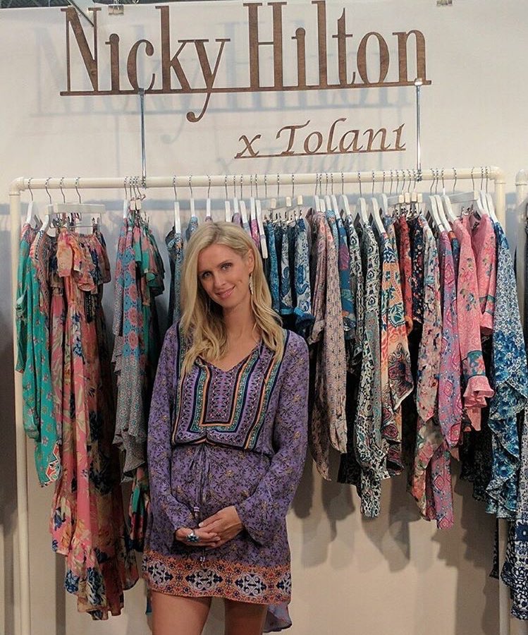 Surprised @NickyHilton at her booth at #Coterie! Loving her new capsule with @TolaniFashion! #NHxTolani https://t.co/fRysUK3UDI