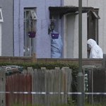 UK lowers terror threat level as subway bomb probe advances