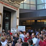 Protesters march in St. Louis suburb over police shooting: 'No justice, no profits'