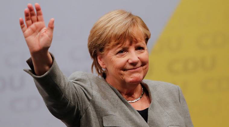 As tricky coalition talks loom, Angela Merkel hopes for regional poll boost
