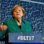 Angela Merkel plays down state election defeat before crucial coalition talks