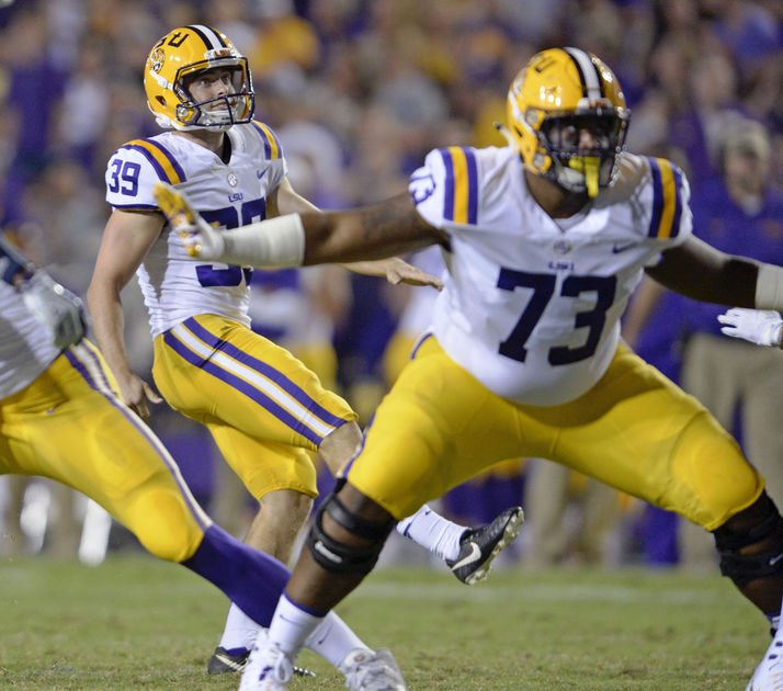 With another new guy aboard, LSU's O-line searching for balance with a running game that's skewed outside