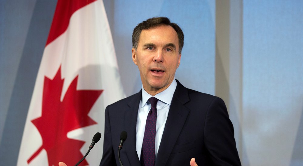 Bill Morneau slammed for using ‘loophole’ to avoid placing shares in blind trust