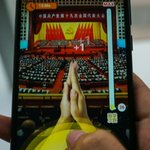 China mobile users tap phones to 'applaud' president's speech