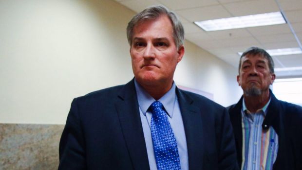 Former police officer convicted of fatally shooting daughter's black boyfriend