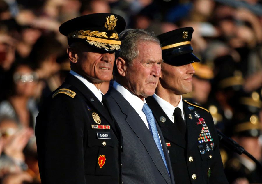 Bush takes veiled swipe at Trump, defends immigration and trade