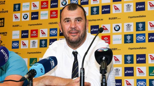 Wallabies coach Michael Cheika resists a return serve at Nick Farr-Jones