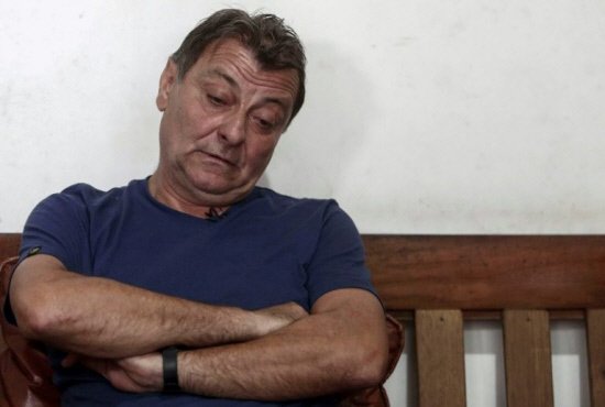 At Brazil seaside, Italy fugitive awaits court ruling
