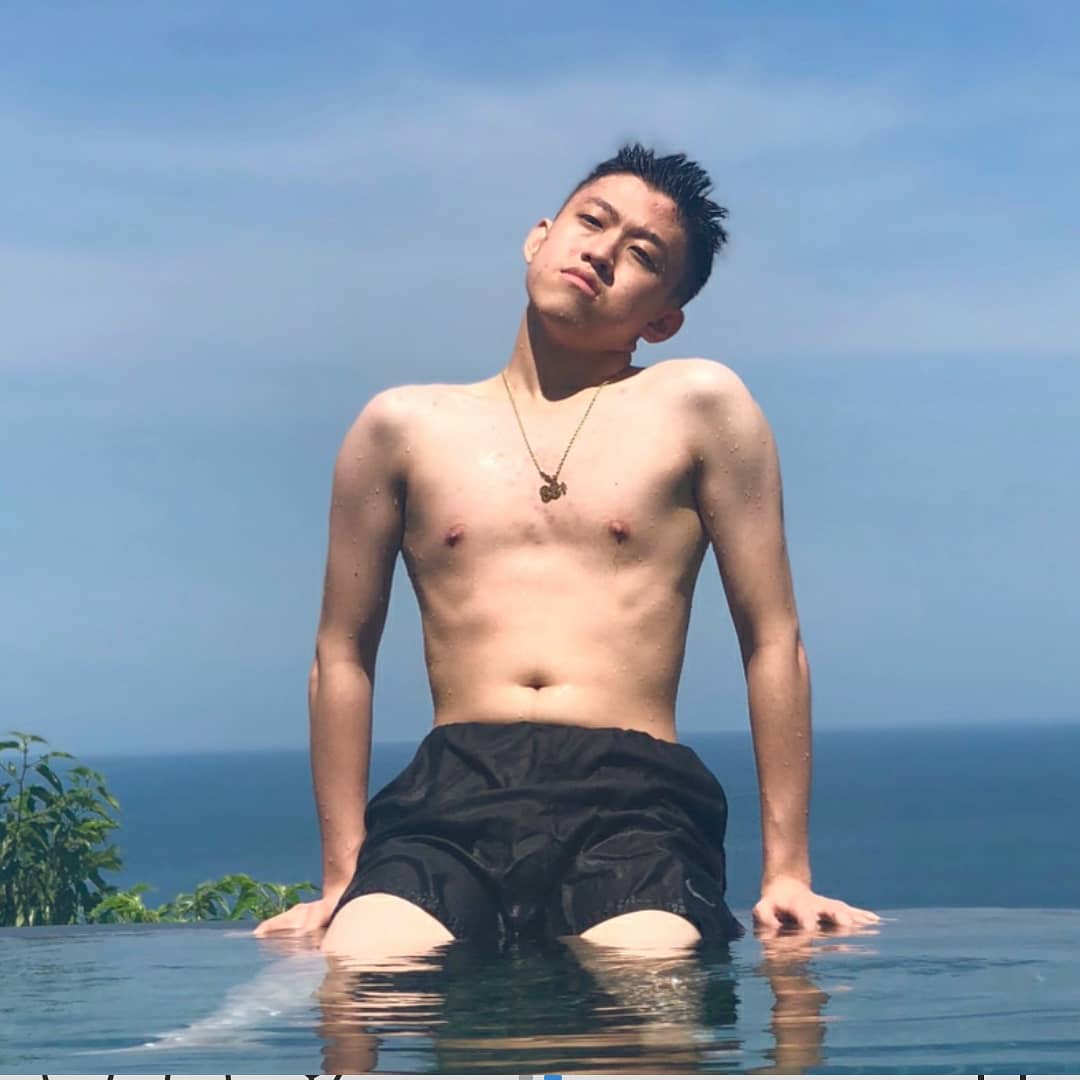 The Virgo with shirtless thin body on the beach
