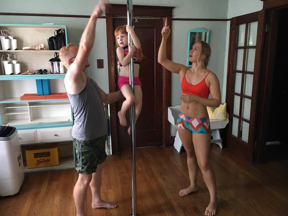 St. Louis parents teaching their 2 daughters to pole dance. 